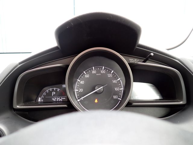 10865631
