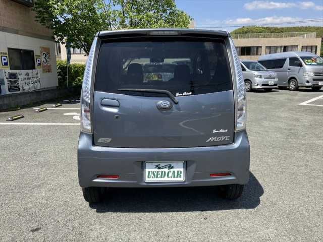 11565700