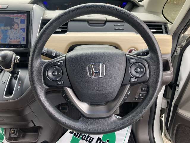 12560823