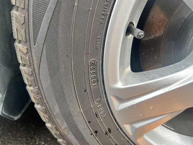 12850077