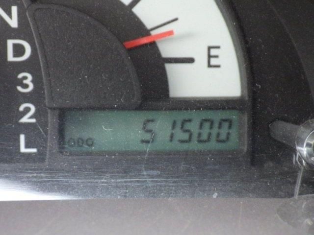 15565410